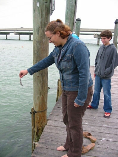 Kids Feeding the Fish